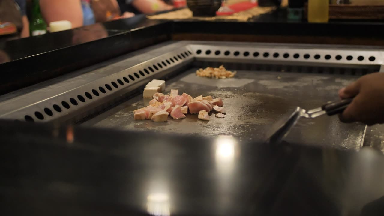 A chef working in a commercial kitchen