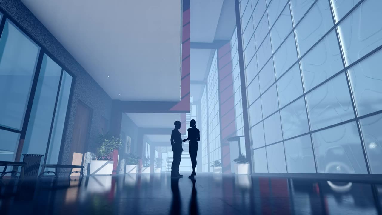 Professionals walking through a corporate building lobby