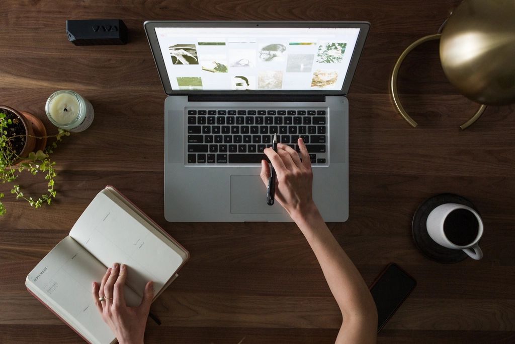 An entrepreneur working on a laptop